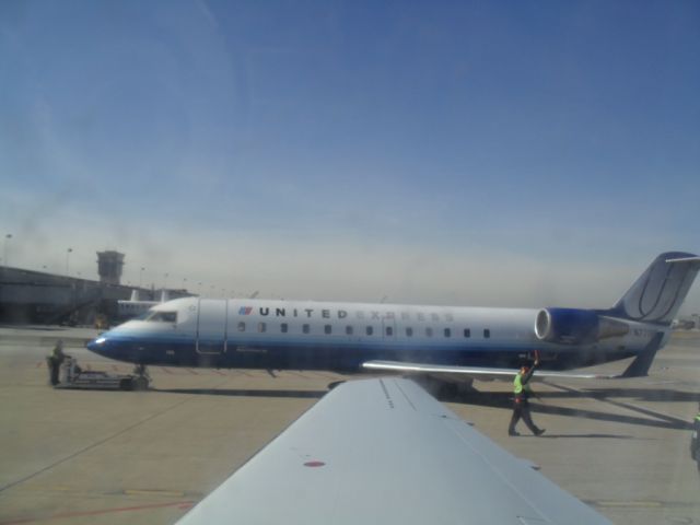 Embraer ERJ-145 (N77195) - UNITED EXPRESS AT IAD OPERATED BY MESA AIRLINES. 1-25-10