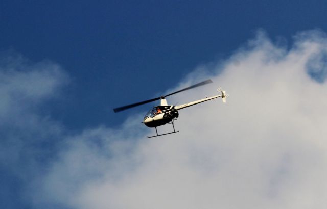 Robinson R-22 (N8042B) - Flying over My home north of KTIP, Rantoul IL.