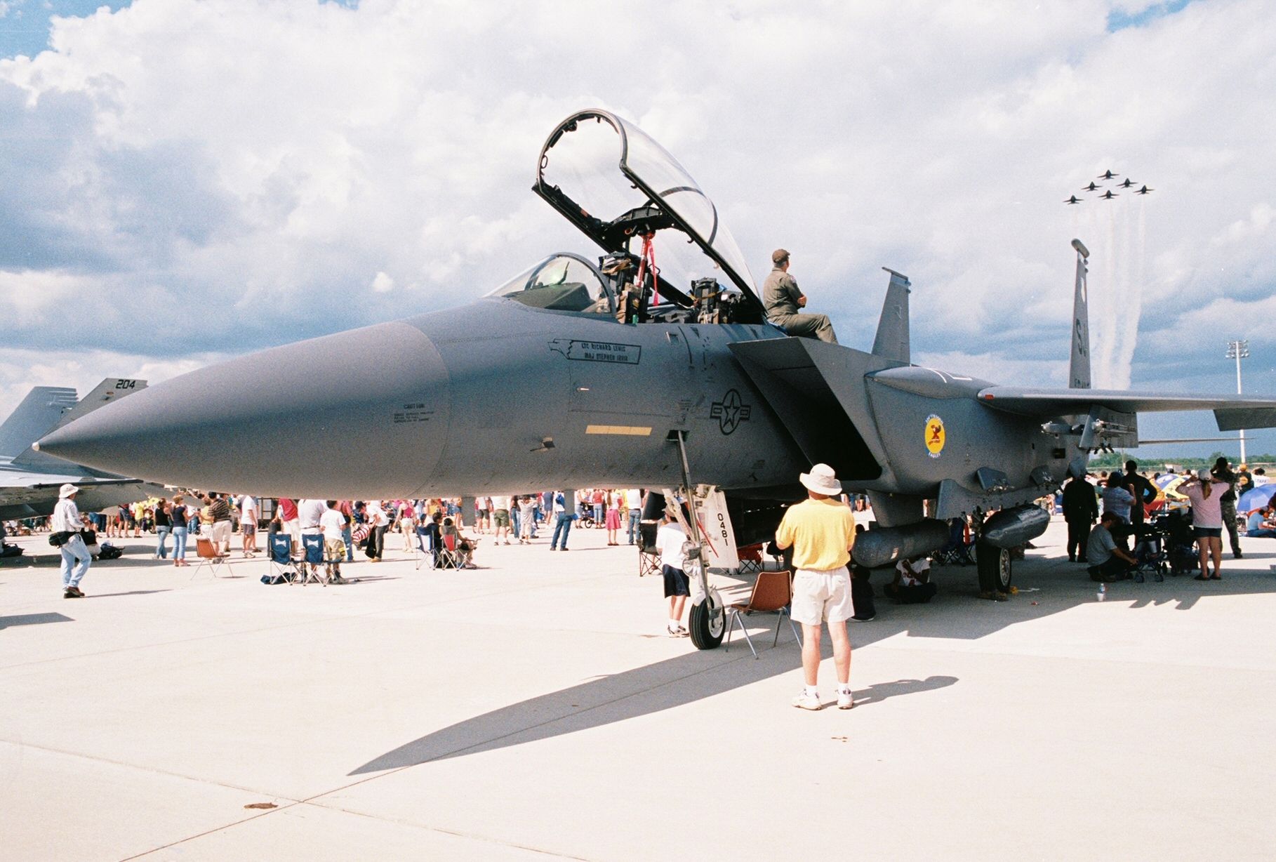 McDonnell Douglas F-15 Eagle (89-0481) - A McDonnell-Douglas F-15E Strike Eagle, USAF s/n 89-0481, msn 1128/E103, showing at the Barksdale AFB Airshow in 2005. This Strike Eagle is from Seymour Johnson AFB in North Carolina. At the time of the photo the aircraft was assigned to 4th Fighter Wing, 334th Fighter Squadron "Fighting Eagles". All eyes are aptly focused on the U.S. Navys Blue Angels Flight Demonstration Team as they are roaring overhead.