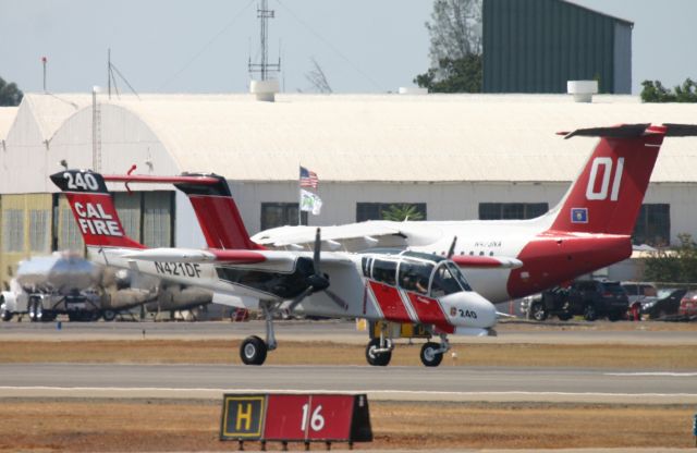 North American Rockwell OV-10 Bronco (N421DF) - KRDD - Calfire Air Boss 240 returning for fuel at Redding Sept 11th, 2014 during one of the many wildfires burning north state 2014