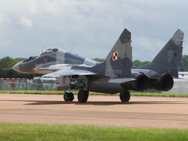 — — - A Polish Mig 29 Fulcrum taxies out, about to perform an aerial display at RIAT 2012.