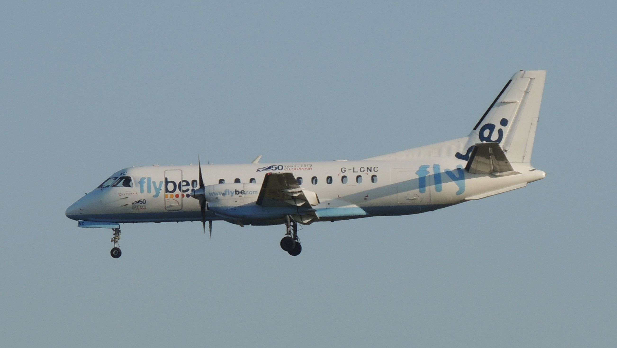 Saab 340 (G-LGNC) - I was on the beach at Inganess Bay near Kirkwall airport on the Orkney Islands when this flight arrived from Aberdeen.  I caught this shot just before touch-down.