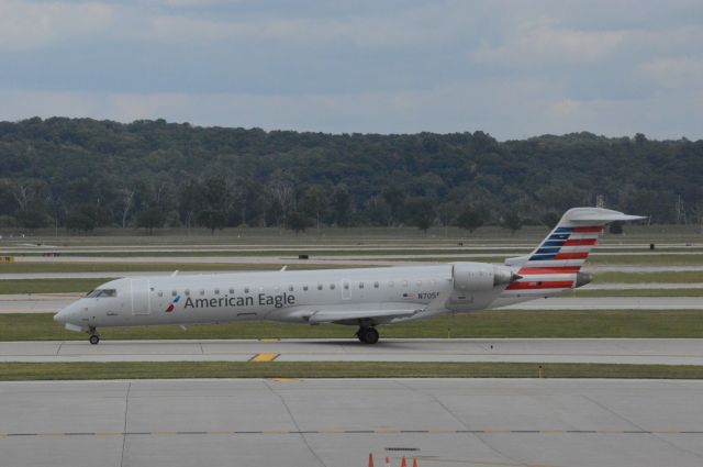 N705SK — - American Eagle (SkyWest) 2889 is taxing out to runway 14L for departure out to Chicago OHare at 3:42 PM CDT.  This aircraft has been in four liveries: United Battleship Gray, United Blue Tulip, United Continental merger, and American post-2013 livery.  Photo taken July 28, 2017 at Omaha Eplley Airfield with Nikon D3200 mounting 55-200mm VR2 lens. 