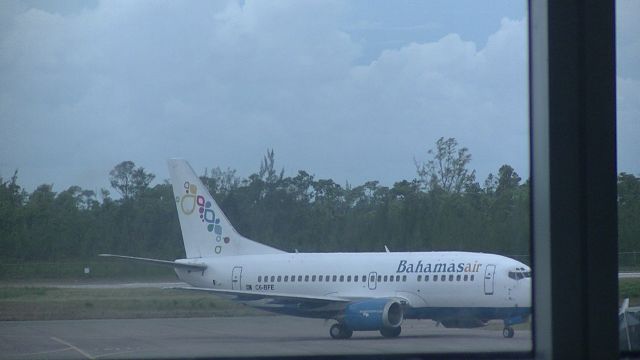 Boeing 737-500 (C6-BFE) - Arriving into the Gate @ MYNN