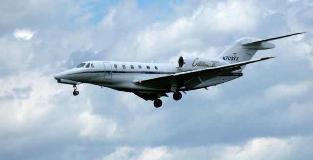 Cessna Citation X (N703TX) - On final is this 2000 Cessna Ciation 750 in the Spring of 2020.