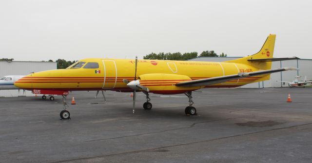 Fairchild Dornier SA-227DC Metro (XA-SUS) - An Aeronaves T.S.M. Swearingen SA227-AC Metro III on the ramp at Tuscaloosa National Airport, AL, under overcast skies - morning of June 26, 2020.