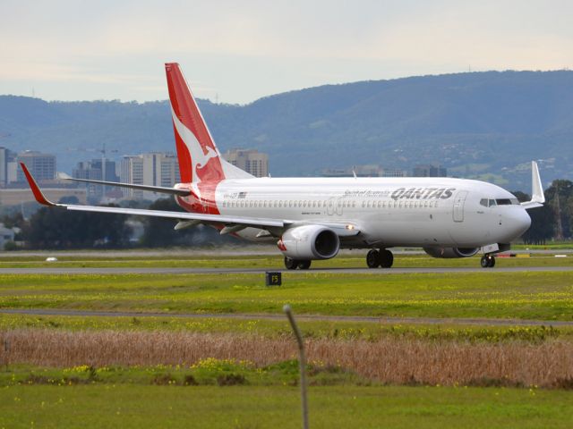Boeing 737-800 (VH-VZP) - On taxi-way heading for take-off on runway 05. Thursday 12th July 2012.