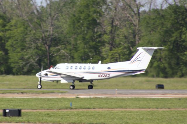 Beechcraft Super King Air 350 (N42ED) - Taking off from KDTN. This is ElDorado Casinos Beechcraft