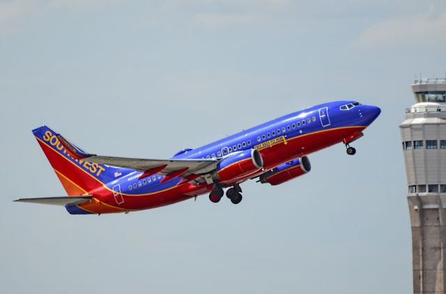 Boeing 737-700 (N215WN) - N215WN Southwest Airlines 2005 Boeing 737-7H4 C/N 32487br /"Free Bags Fly Here"br /br /McCarran International Airport (KLAS)br /Las Vegas, Nevadabr /TDelCorobr /July 12, 2013