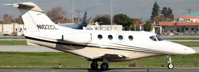 Beechcraft Premier 1 (N102CL) - 02CL, Taxi into position and hold, Southwest on Final to 30-L