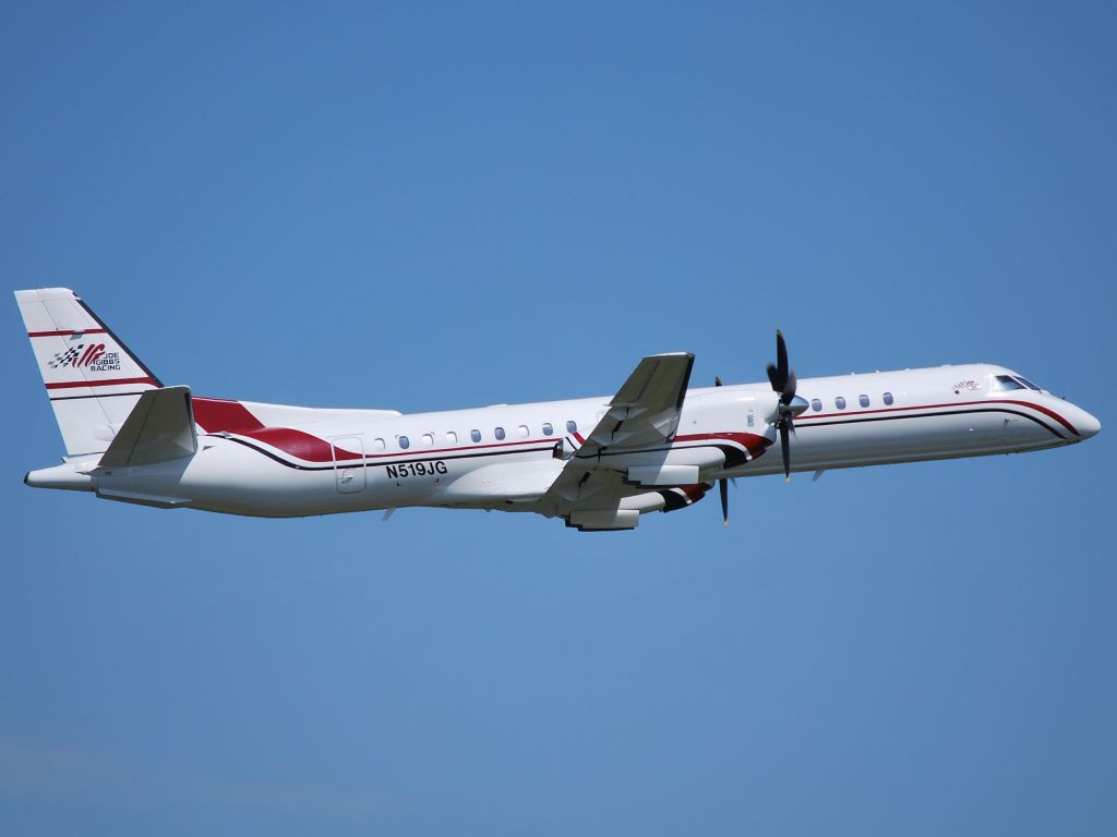 Saab 2000 (N519JG) - JOE GIBBS RACING INC - Departing runway 20 at KJQF - 6/16/10