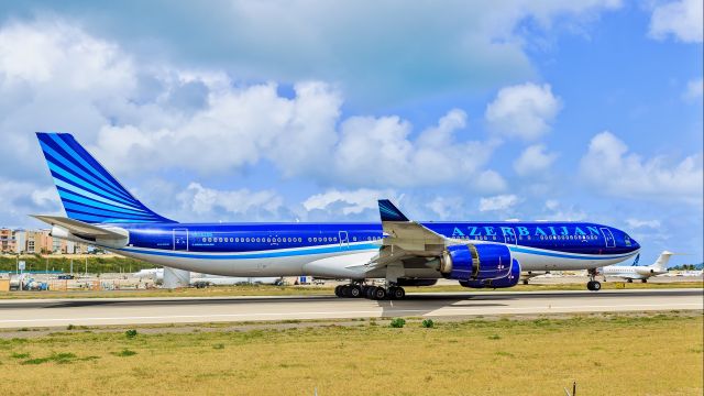 Airbus A340-500 (4KAZ85) - Azerbaijan airlines landing at TNCM St Maarten. 12/03/2016