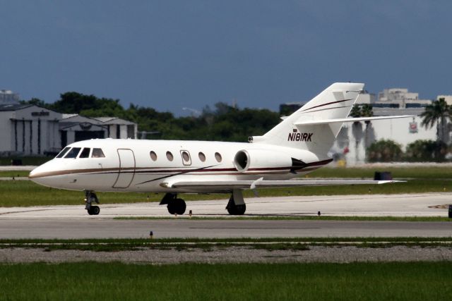 Dassault Falcon 20 (N181RK) - Taxiing to depart rwy 09 on 31-Jul-13.