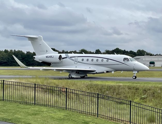 Embraer Legacy 550 (N54RJ) - An Embraer 600 Praetor taxiing by the Runway Park at GMU.  9/19/21