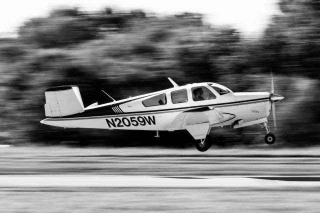 N2059W — - V tail Bonanza taking off from Clermont County. Lighting was backlit so I figured I'd try a fun edit