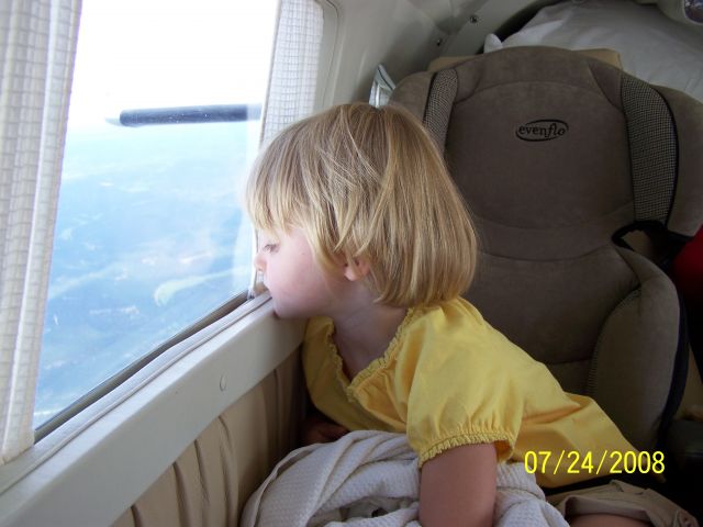 Piper Seneca (N34KG) - Gazing down at the Black Hills of SD.