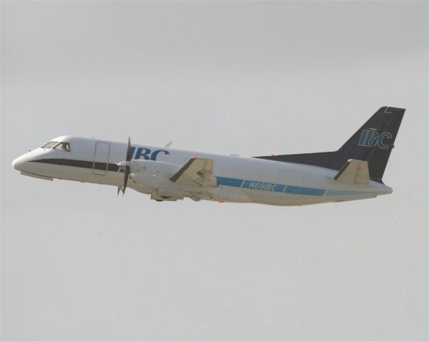 Piper Navajo (N691BC) - Saab 340 of IBC cargo departing MIA March 2011