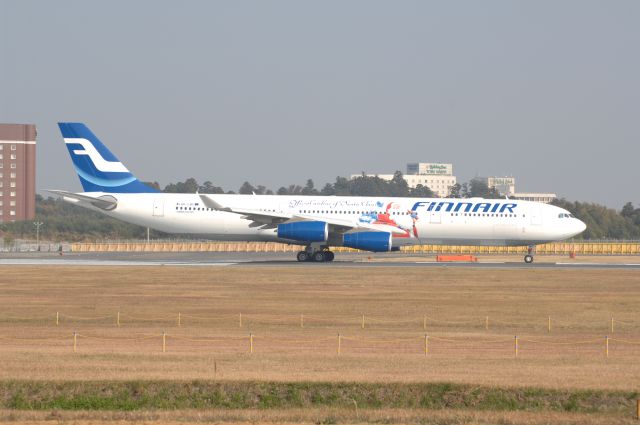 Airbus A340-300 (OH-LQC) - Departure at Narita Intl Airport 16R on 2007/1/25 Santa Claus c/s