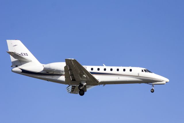 Cessna Citation Sovereign (VH-EXG) - Executive Airlines (VH-EXG) Cessna 680 Citation Sovereign on approach to runway 25 at Sydney Airport.