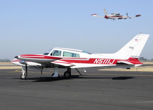 Cessna 310 (N5111J) - Cessna 310 taxiing and taking-off at Merced Regional Airport (KMCE)