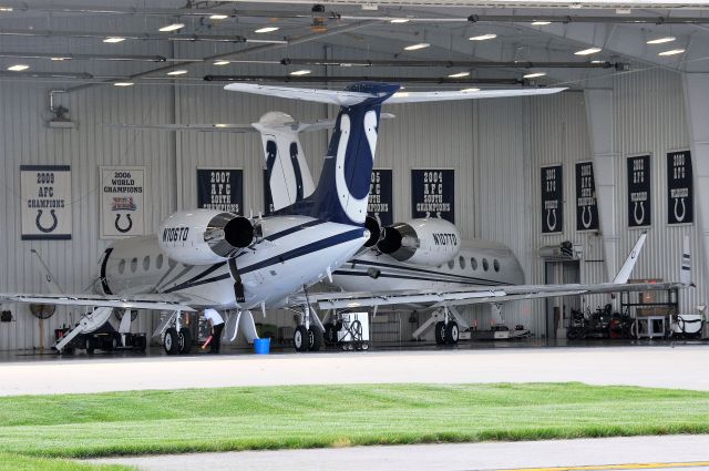 N106TD — - Both of the Indianapolis Colts Gulfstreams tucked inside the hanger, the other being inside the hangar as well. The Colt's owner Jim Irsay also has A 737BBJ, N101TD, which currently parks inside one of the Comlux hangars on the opposite side of the field. Directly opposite this hangar shown they are building a rather large new hangar to house the owners 737. 