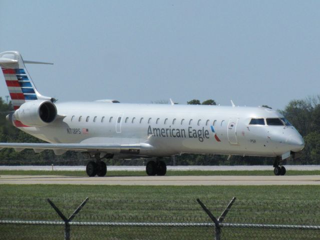 Canadair Regional Jet CRJ-700 (N718PS) - American Airlines CRJ-700 taxing parallel to runway 18/36C at CVG