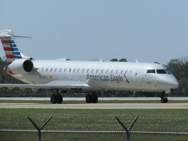 Canadair Regional Jet CRJ-700 (N718PS) - American Airlines CRJ-700 taxing parallel to runway 18/36C at CVG