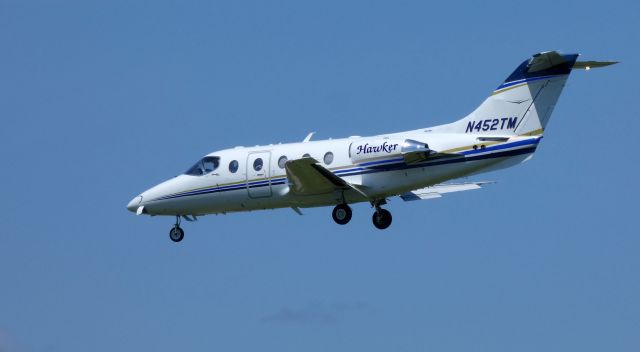 Beechcraft Beechjet (N452TM) - On final is this 2008 Hawker Beechcraft Beechjet 400XP in the Summer of 2019.