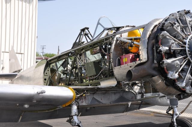 N7973C — - Prepping an SNJ for paint.