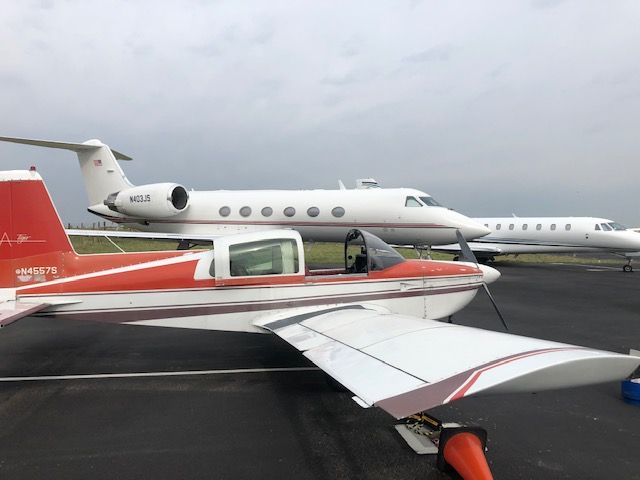 N4557S — - A 2000 Gulfstream G-IV nudging up to a 1979 Gulfstream American Tiger, 21 years its senior.