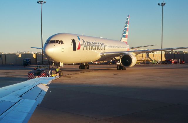 BOEING 767-300 (N7375A) - AA 767-323/ER N7375A seen from AA MD-83 N76201 at DFW on Oct 30, 2014.