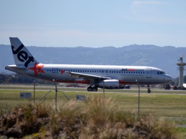 Airbus A320 (VH-JQG) - On taxi-way, heading for take off on runway 05.