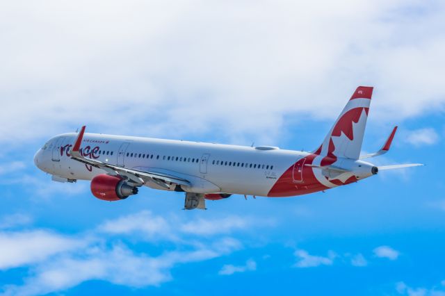 Airbus A321 (C-FJQL) - An Air Canada Rouge A321 taking off from PHX on 2/11/23 during the Super Bowl rush. Taken with a Canon R7 and Canon EF 100-400 II L lens.