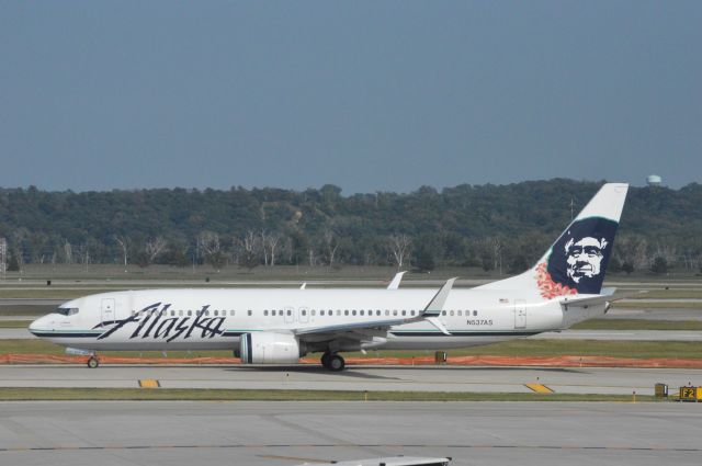 Boeing 737-800 (N537AS) - Alaska 731 taxing at Omaha for departure to Seattle 28 minutes late at 4:43 PM CDT.   Taken August 11, 2016 with Nikon D3200 mounting 55-200mm VR2 lens. 