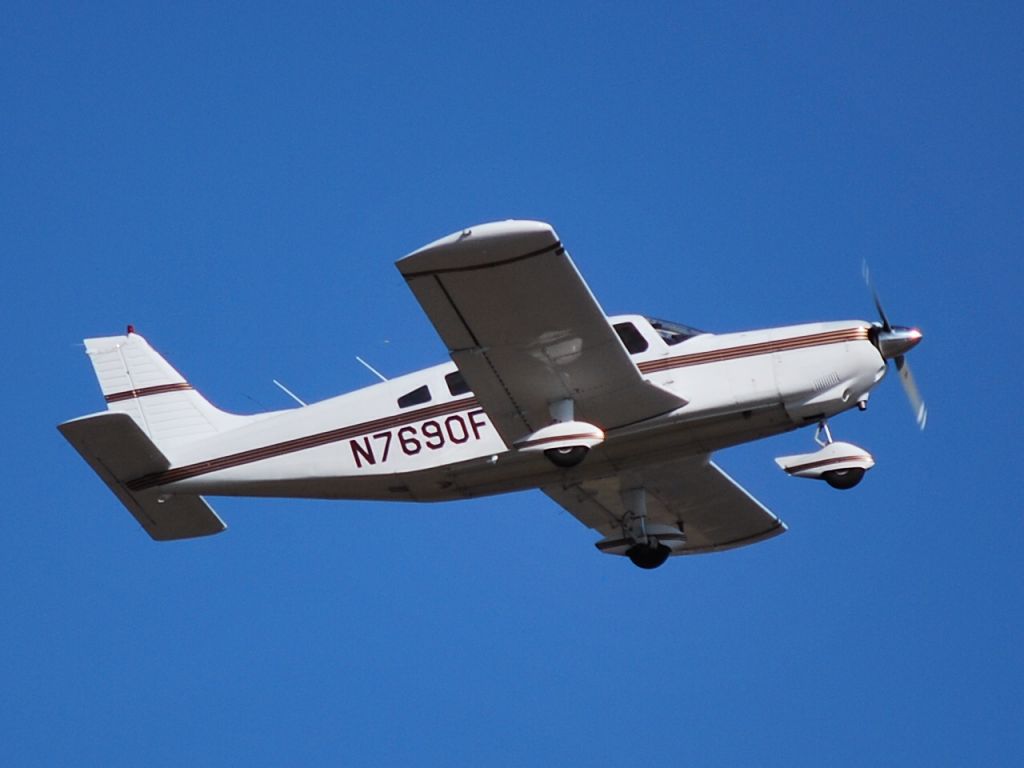 Piper Saratoga (N7690F) - Departing runway 20 at Concord Regional Airport - 3/4/09