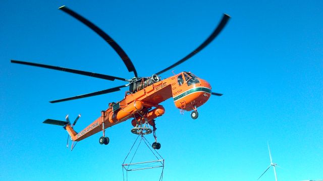 — — - Near pincher creek,ab flying towers from build site to tower sites