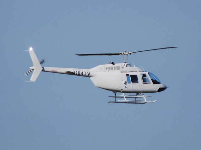 Bell JetRanger (N104TV) - U S HELICOPTERS INC shuttling race fans to/from the Coca-Cola 600 at KJQF - 5/26/13