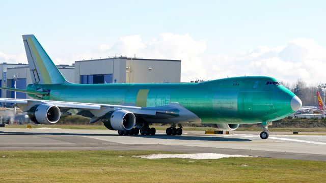 BOEING 747-8 (N614UP) - BOE539 taxis onto Rwy 16R for a ferry flight to KPDX on 2.21.19 where it will be painted. (ln 1552 / cn 64260).