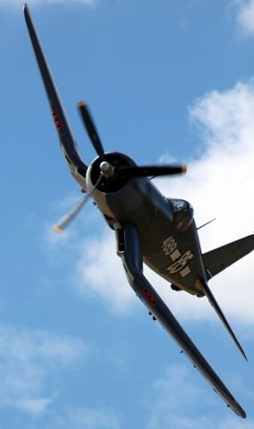 VOUGHT-SIKORSKY V-166 Corsair (N209TW) - Flashback to 2017 ~~br /The Texas Flying Legends Museum's Goodyear FG-1D Corsair N209TW / NX209TW, seen here participating in an Unlimited Class Race as Race 85 "Whistling Death" and piloted by Michael Schiffer (Ovid, MI) during the 2017 National Championship Air Races (aka; Reno Air Races), comes overhead as it makes the turn at pylon 1.