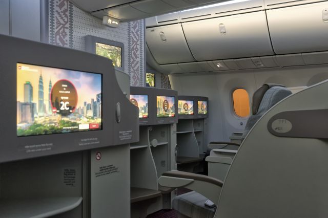 Boeing 787-8 (S2-AJU) - 24th Dec., 2019: View across the 2-2-2 seating Business Class cabin on board Biman's three month old Boeing 787-800 Dreamliner operating flight BG 086 from Dhaka's Zia International Airport to KLIA, Malaysia. The cabin is pretty much a replica of United Airlines' Polaris class configuration. The seats do lie flat, screens can be touch controlled and there's plenty of cabinet space for storing all sorts of travel accessories.