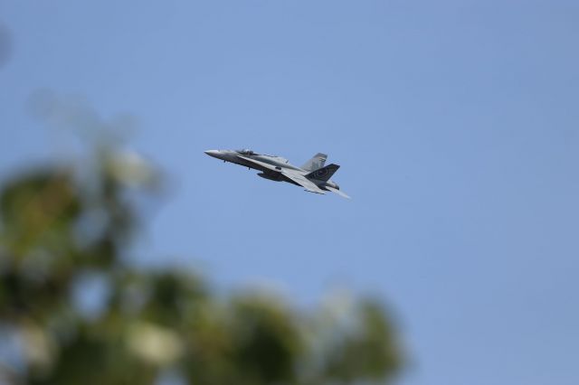 — — - CF-18 Demo jet flying over Thompson, Manitoba