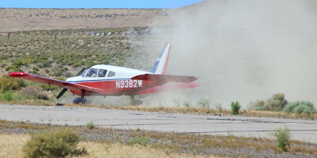 Piper Cherokee (N9382W) - N9382W, a Piper Cherokee 28-235, is snapped here about two and a half hours ago as it is going off runway 15 and into the desert while landing at Fernleys Tiger Field. The pilot can be seen here being propelled forward as the plane skids off into gravel, dirt, and sagebrush but his seatbelt was buckled and both occupants of the Cherokee emerged uninjured from the crash. Runway 15-33 at Tiger Field is presently closed because the Piper came to a stop near the western edge. N9382W is a gorgeous Piper and fortunately the damage to it appears to be relatively minor. br /The Piper had departed Reno-Tahoe International just a few minutes before this landing accident at N58 (Tiger Field).