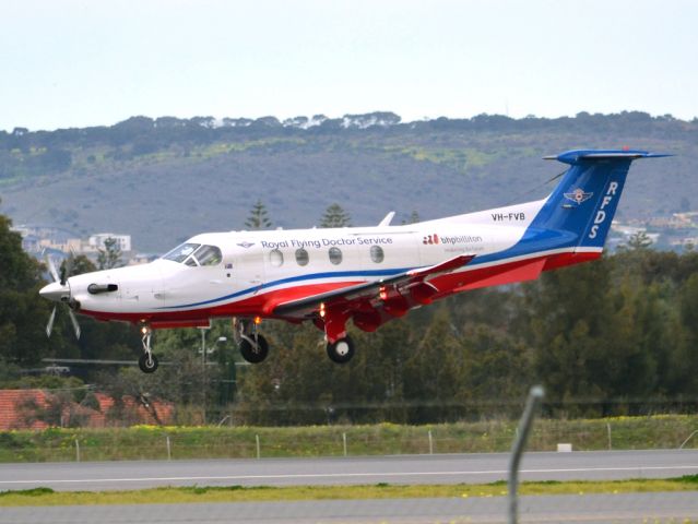 Pilatus PC-12 (VH-FVB) - About to put down on runway 05. Thursday 12th July 2012.