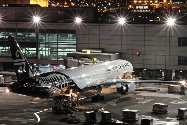 BOEING 777-300 (ZK-OKR) - Loading for its flight back to aukland