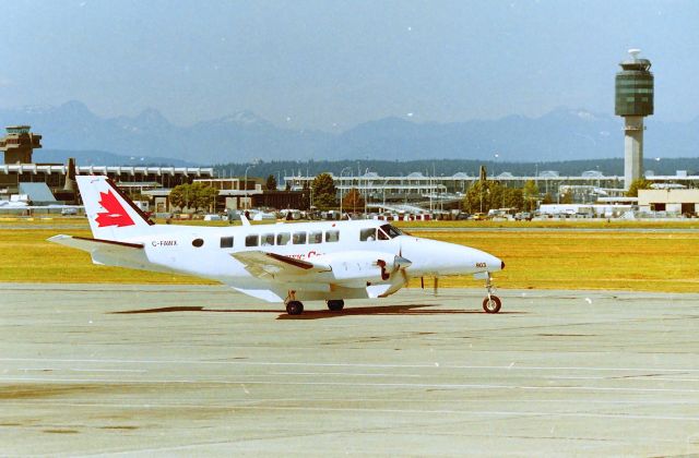 Beechcraft Airliner (C-FAWX) - CYVR - Pacific Coastal B-99 headed to the departure runway - photo date apprx  April 2004.