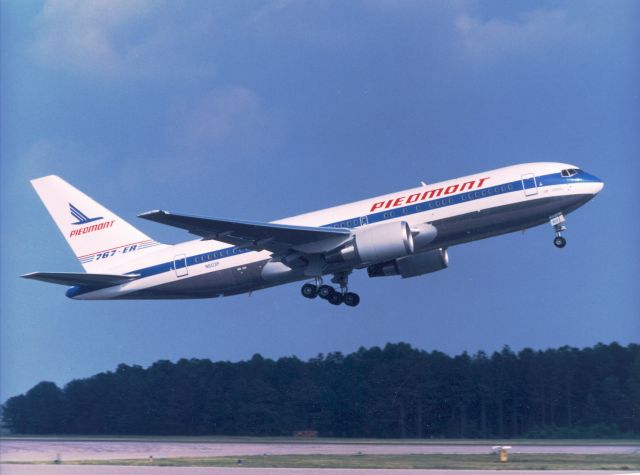 N603P — - The Pride of Piedmont leaves the Charlotte, NC hub on June 15, 1987 with 187 passengers on the inaugural flight bound for Londons Gatwick Airport.  The flight marked the inauguration of transatlantic service for Piedmont Airlines. (Photo courtesy of the Piedmont Aviation Historical Society) 