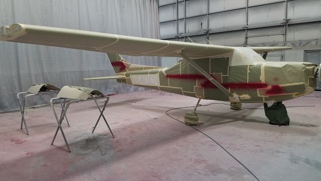 Cessna Skyhawk (N6400V) - Red coat at Boss Inc