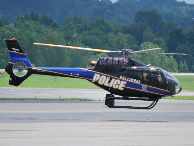 Eurocopter EC-120 Colibri (N452F) - BALTIMORE POLICE DEPARTMENT ("Foxtrot Two") is one of two brand new helicopters just picked up from the factory in Grand Prarie, TX. Here at KJQF for a fuel stop on the way home. Super nice officers were so kind as to invite my two young boys take a closer look before they departed. - 7/20/12