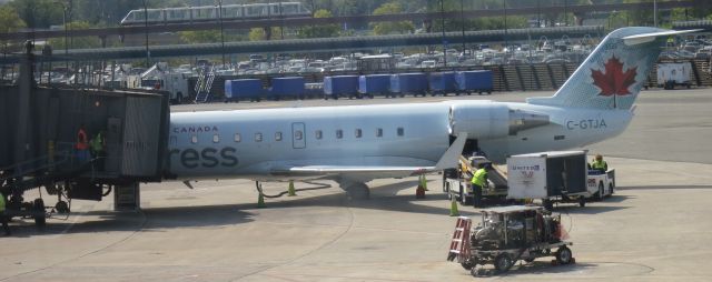 Canadair Regional Jet CRJ-200 (C-GTJA) - An Air Canada Express CRJ-200 at Newark Liberty International Airport (KEWR) on August 25, 2014.