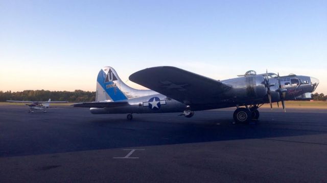 Boeing B-17 Flying Fortress (N9323Z) - Boeing B-17 and Cessna 182 on the ramp at Texarkana Flying Club.